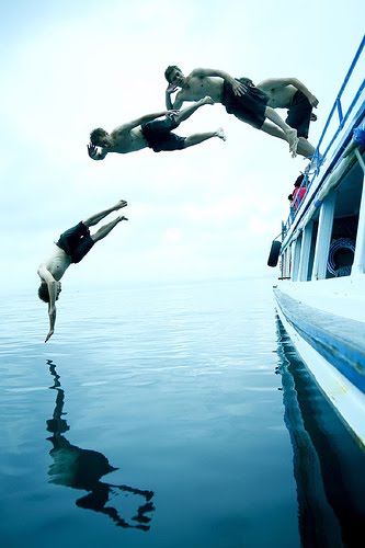 A powerful, horizontal dive is the goal. Diving like a champ from a boat