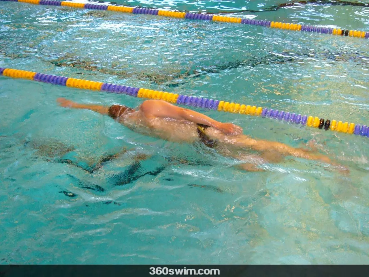 Extend your bottom arm and kick on your side Extend your bottom arm and kick on your side